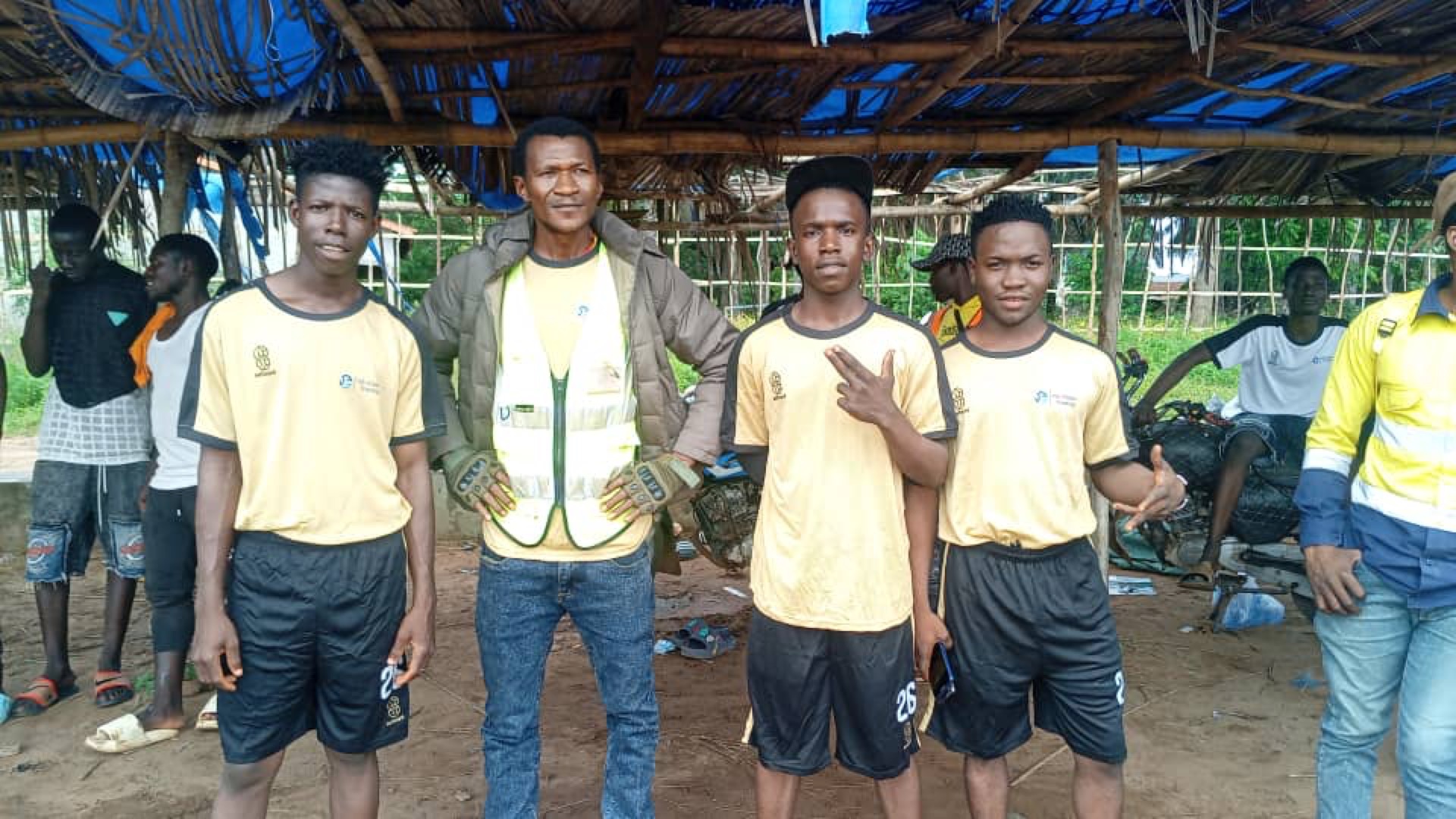 N5 staff in yellow jerseys during a team-building football match